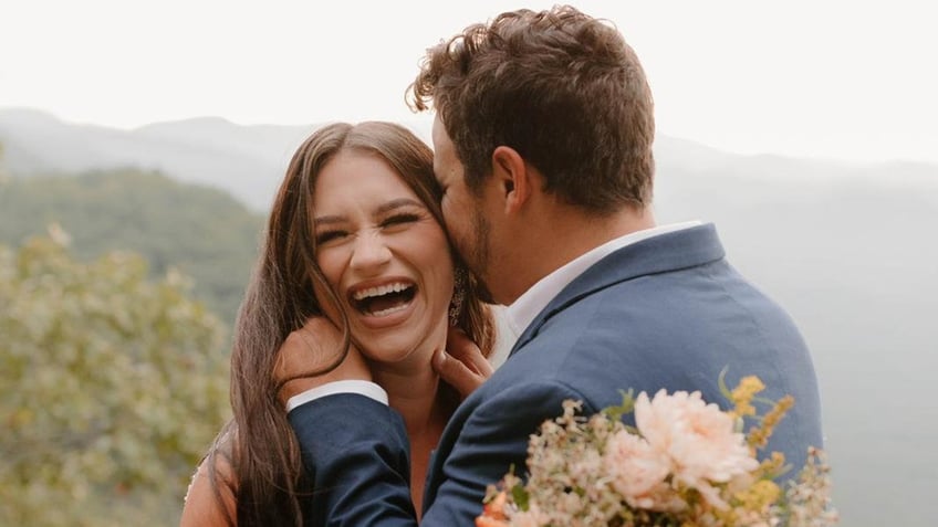 Alexandrea Acevedo and her husband, Michael, pose for photos for their vow renewal