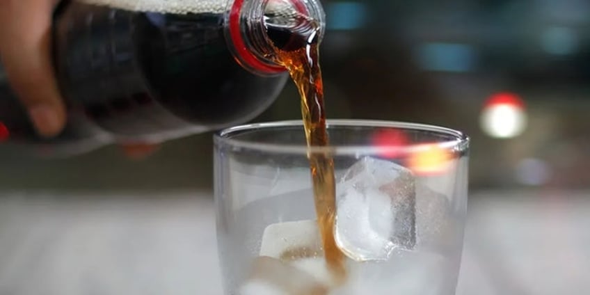 women drinking sugar sweetened beverages have increased liver cancer disease risk researchers find