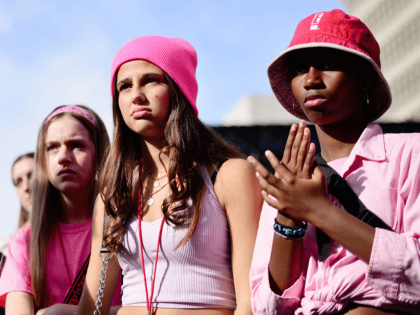 LOS ANGELES, CALIFORNIA - JANUARY 18: Activists participate in the 4th annual Women's Marc