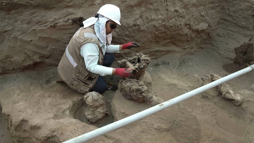 workers uncover 8 mummies and pre inca objects while expanding gas network in peru