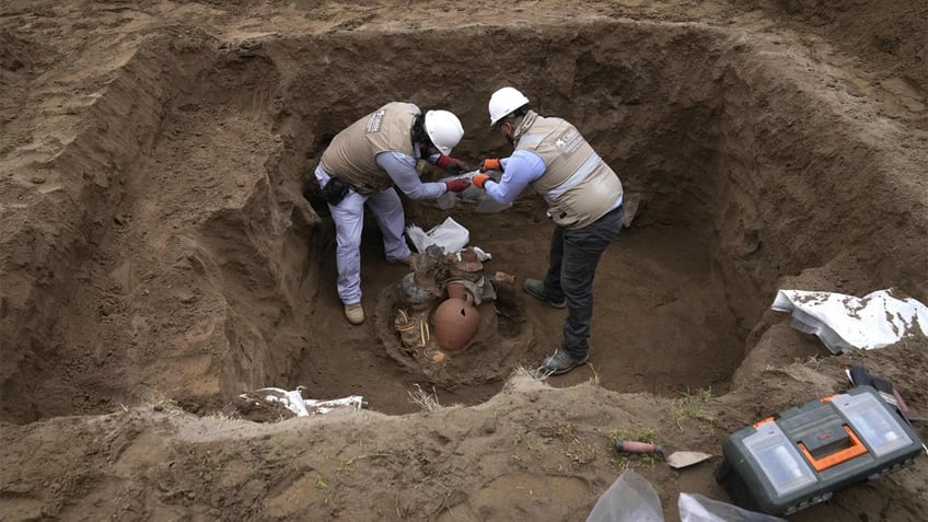 workers uncover 8 mummies and pre inca objects while expanding gas network in peru