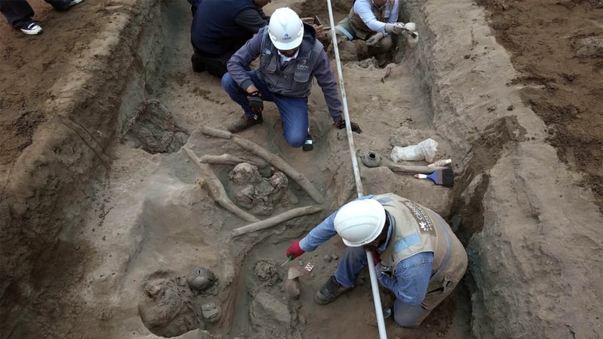 workers uncover 8 mummies and pre inca objects while expanding gas network in peru