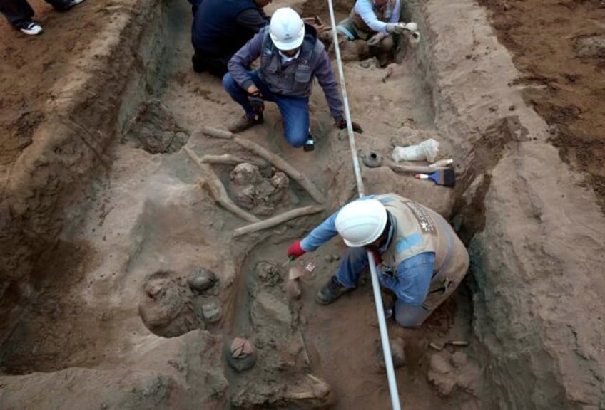 workers uncover eight mummies and pre inca objects while expanding the gas network in peru