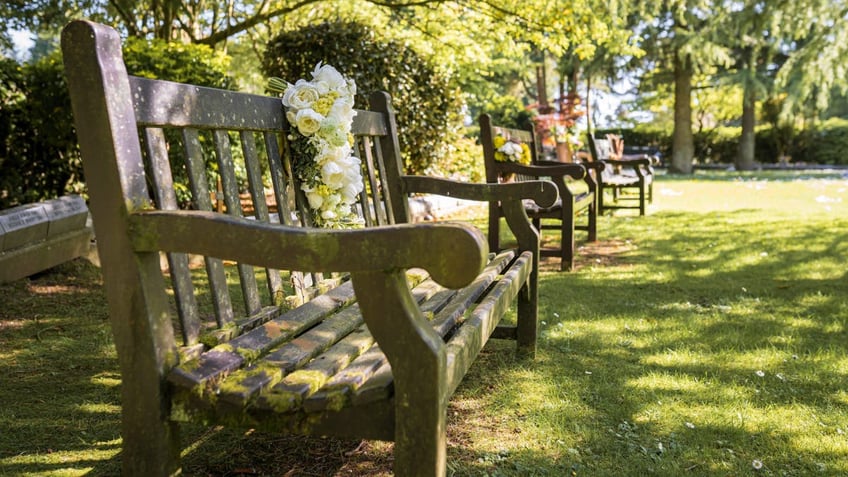 Benches with flowers on them