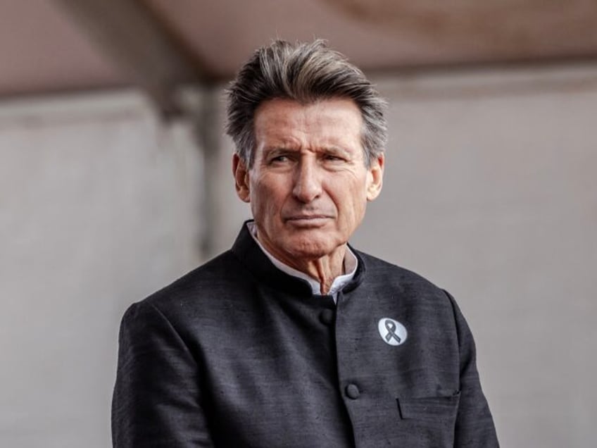 President of the International Athletics Federation Sebastian Coe (2nd R) looks on while a
