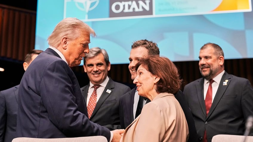 President Donald Trump greets North Macedonia's President Gordana Siljanovska-Davkova.