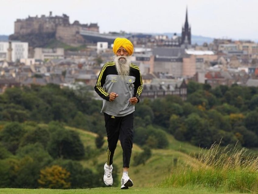 EDINBURGH, SCOTLAND - SEPTEMBER 01: Fauja Singh poses for pictures after being the first