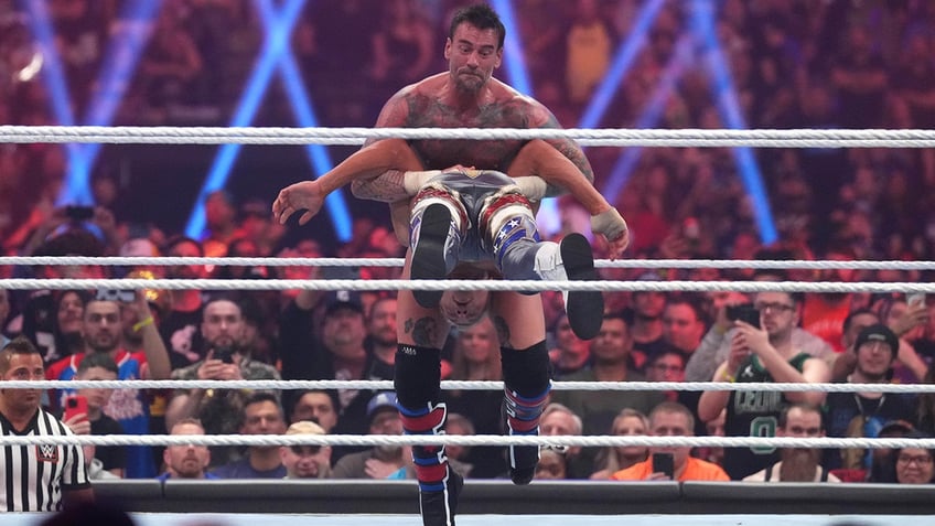 CM Punk and Cody Rhodes battle