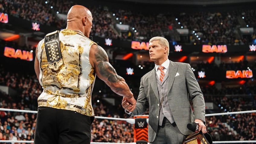 Cody Rhodes shakes The Rock's hand