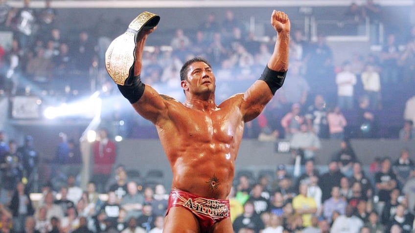 Batista with the title