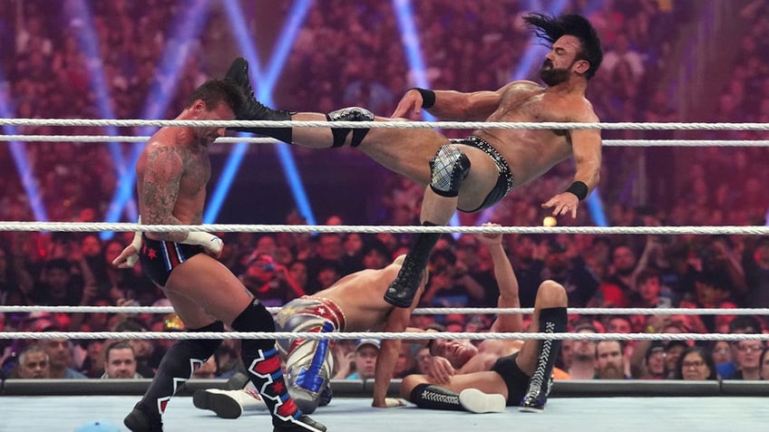 Drew McIntyre delivers a kick