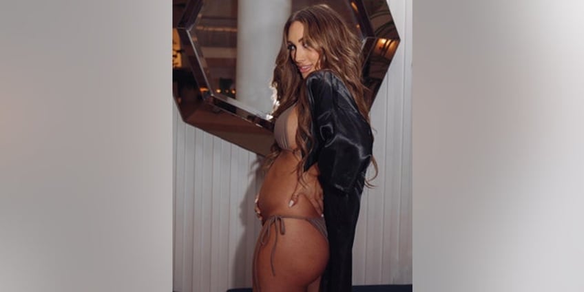 wwe star struts miami catwalk while pregnant theres no shame in it