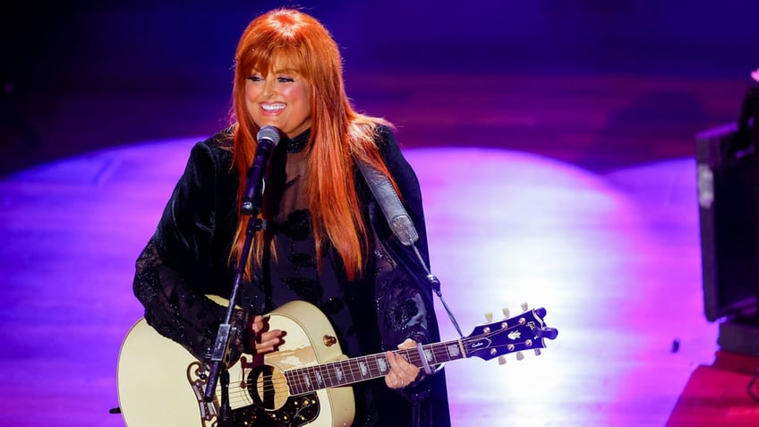 Wynonna Judd with guitar