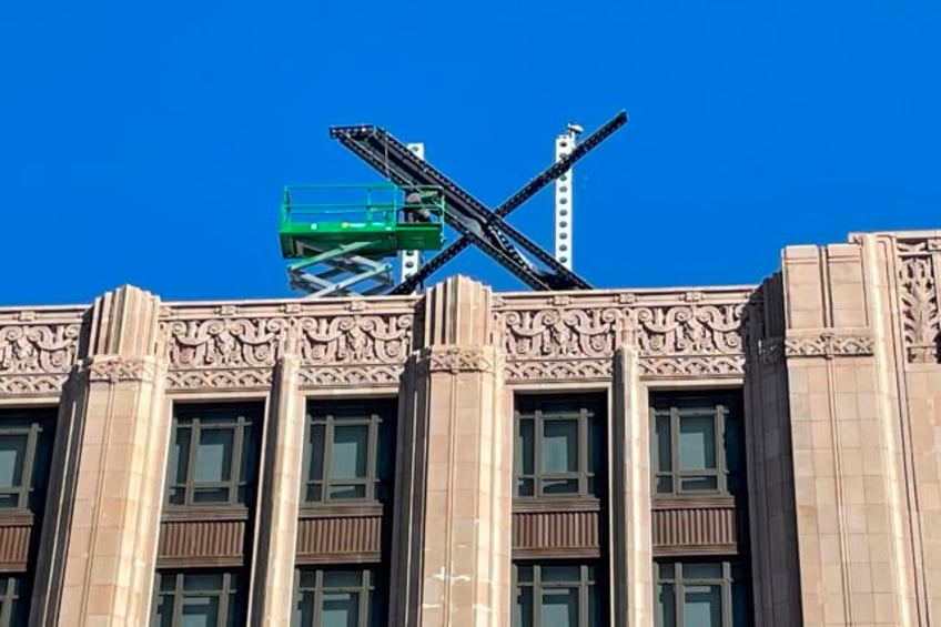 x logo installed atop twitter building spurring san francisco to investigate permit violation