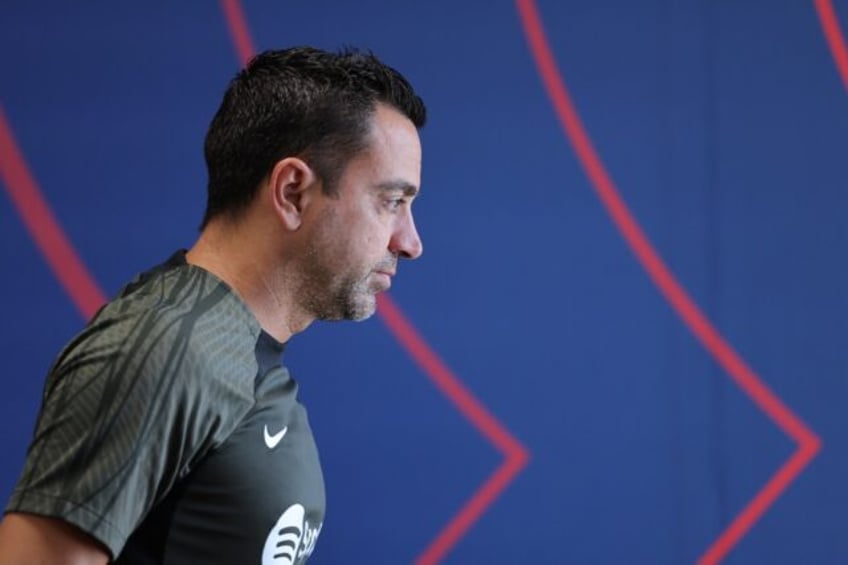 xavi extends barcelona contract until 2025