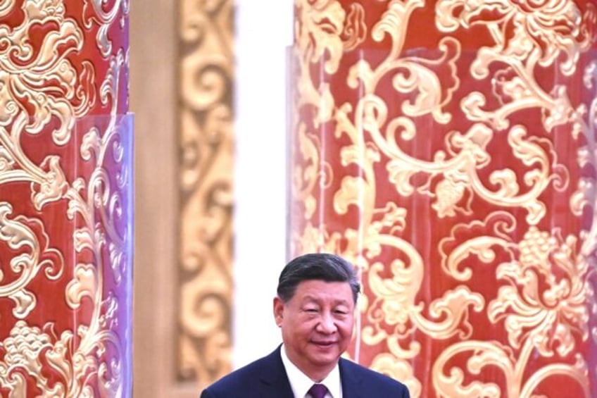 Chinese President Xi Jinping arrives for a ceremony in Beijing marking the 70th anniversar