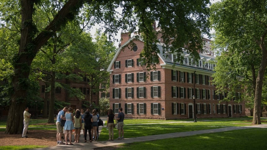 A campus tour stops on the campus of Yale University in New Haven, CT, U.S.