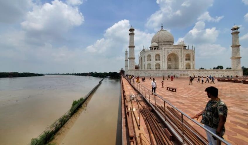 yamuna river reaches the iconic taj mahals outer walls in india after swelling with monsoon rains