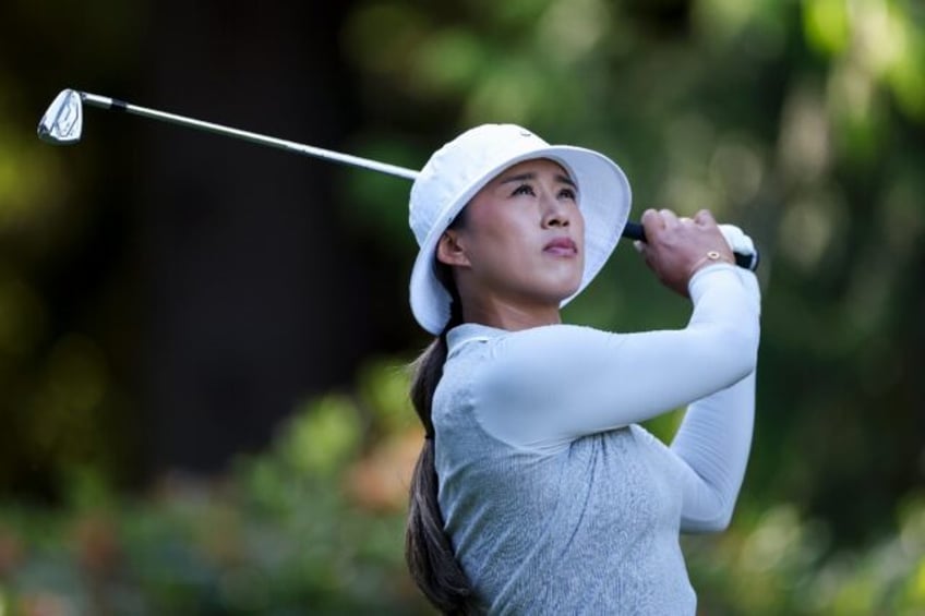 South Korea's Amy Yang fired a bogey-free 68 to grab a share of the lead after the second