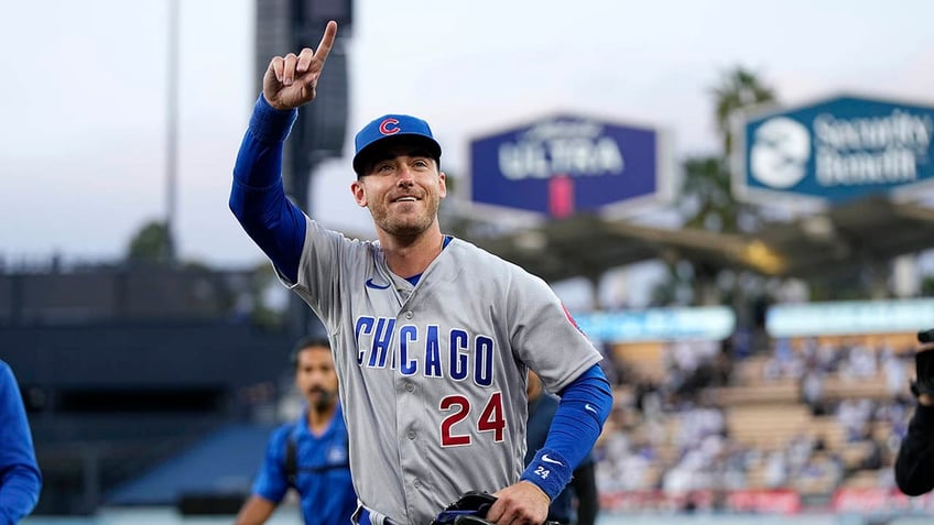 Cody Bellinger pointing to fans