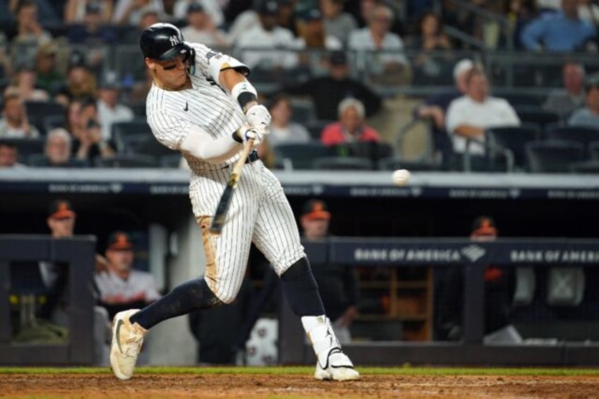 New York star Aaron Judge hits a two-run homer in the Yankees' victory over the Baltimore