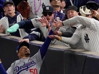 Yankees fans try to rip glove off Mookie Betts' hand, pry ball out