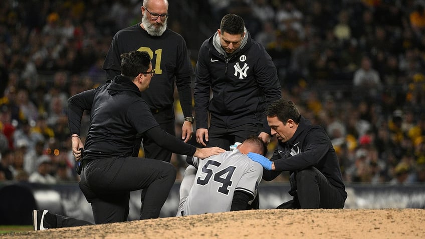 yankees pitcher bloodied carted off after taking 100 mph line drive off head