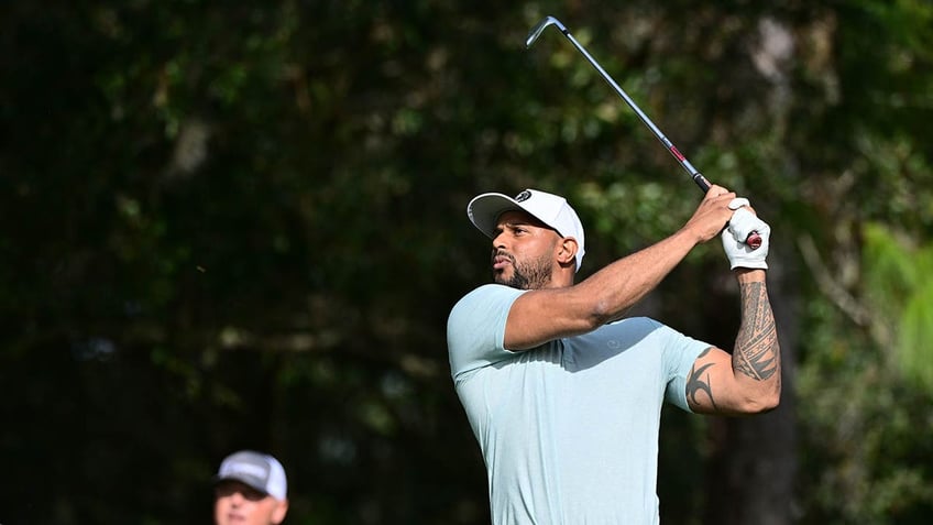 Aaron Hicks golfing