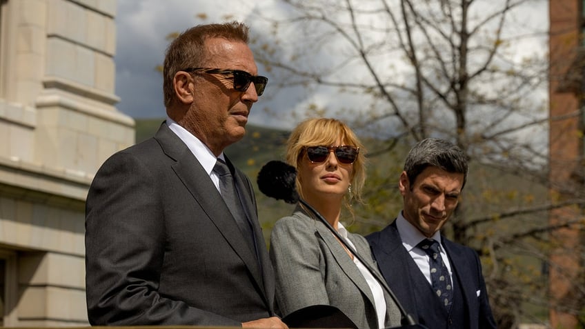 Kevin Costner, Kelly Reilly, and Wes Bentley in a scene from Yellowstone