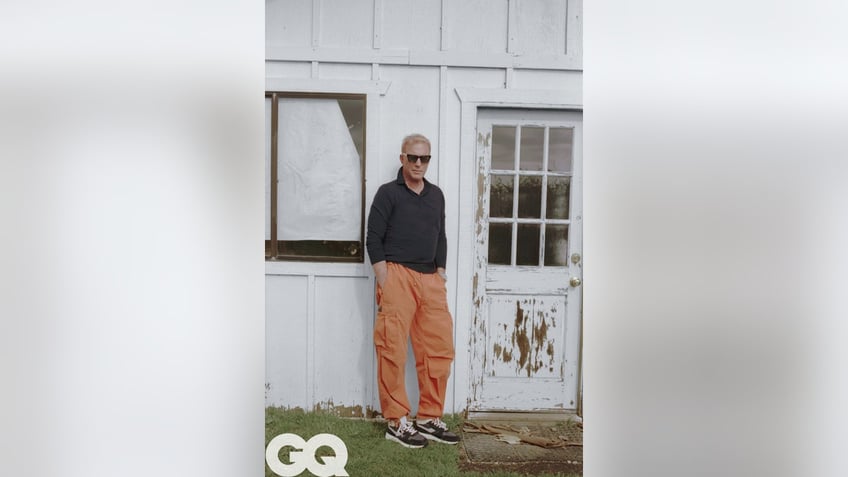 Kevin Costner posing in GQ photo