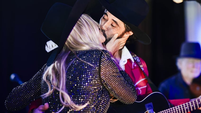 Hassie Harrison kisses Ryan Bingham