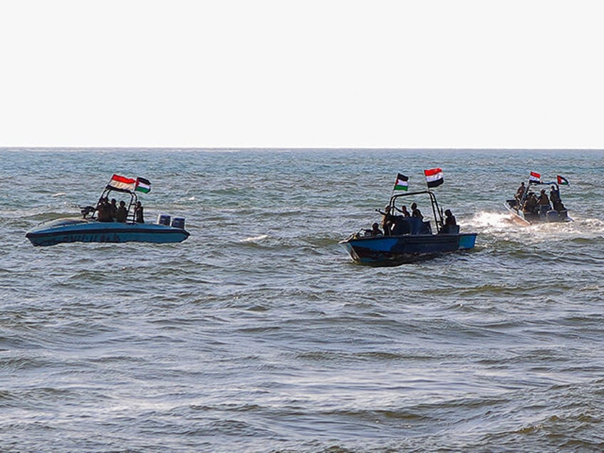 Members of the Yemeni Coast Guard affiliated with the Houthi group patrol the sea as demonstrators march through the Red Sea port city of Hodeida in solidarity with the people of Gaza on January 4, 2024, amid the ongoing battles between Israel and the militant Hamas group in Gaza. (Photo …