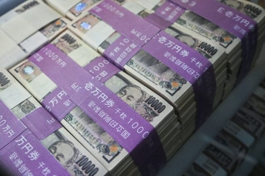 The yen sank to a new 34-year low past 160 per dollar on Monday after a forecast-beating U