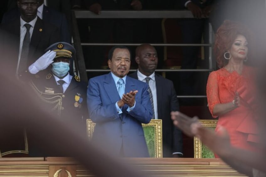 Cameroon President Paul Biya (L), who came to power in 1982, has not yet said if he plans