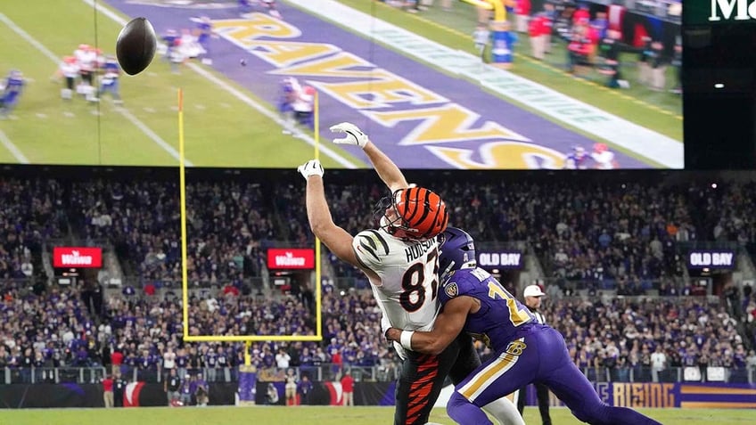 Tanner Hudson tries to catch a pass