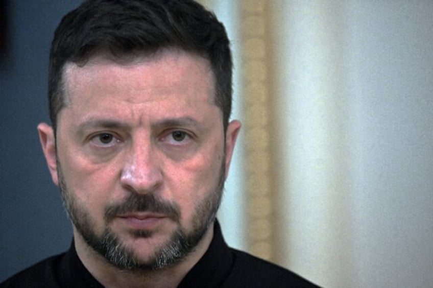zelensky accuses russia of buying time to stall peace talks