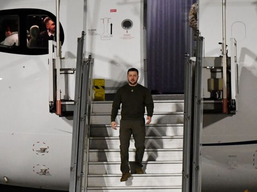 Ukraine's President Volodymyr Zelensky disembarks from a plane as he arrives at Orly airport, outside Paris, before attending a meeting with France's President and Germany's Chancellor on February 8, 2023, following his visit to the United Kingdom. - EU officials are hoping Zelensky will head to Brussels on February 9 …