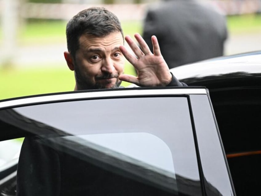 Ukraine president Volodymyr Zelensky leaves after a visit to Neder-Over-Heembeek military