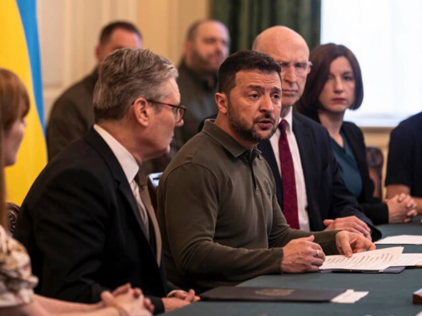 Ukrainian President Volodymyr Zelenskyy addresses an extraordinary meeting of the UK Cabin