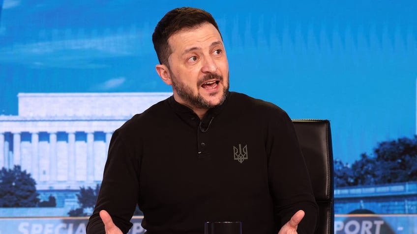 President Zelenskyy speaks with his hands out while seated on 'Special Report'