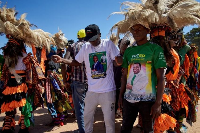 Supporters of Zimbabwe's ruling ZANU-PF at a political rally in Harare ahead of by-elections in which opposition CCC candidates have been excluded