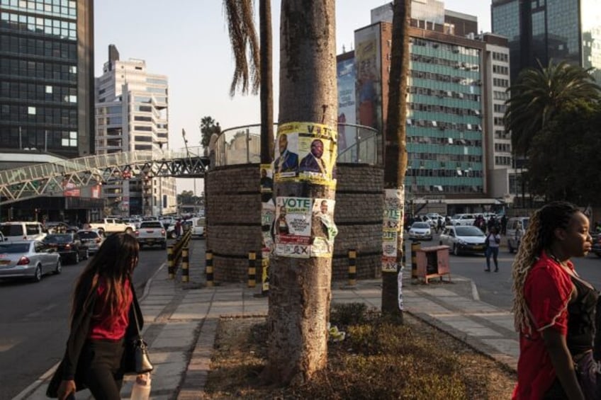 zimbabwe to vote in uphill election for defiant opposition