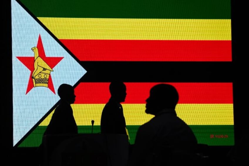 zimbabwes president mnangagwa wins second term in disputed vote