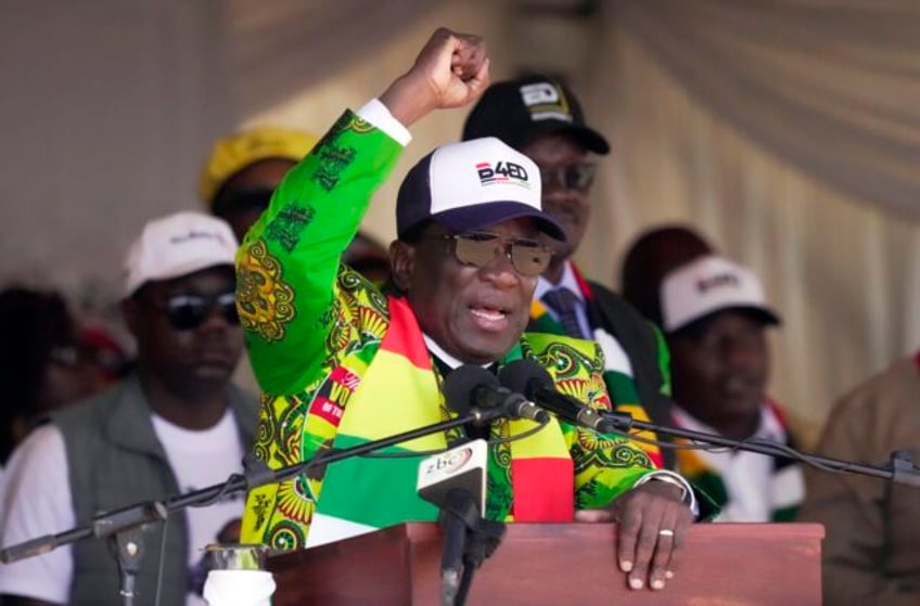 zimbabwes president tells supporters they will go to heaven if they vote for his party this month