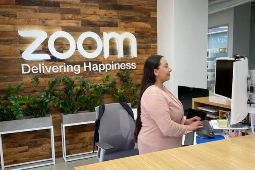 zoom which thrived on the remote work revolution wants workers back in the office part time